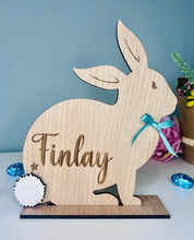 Load image into Gallery viewer, Personalised wooden Easter bunny decoration, engraved with custom name. Perfect for Easter gifts, baskets, and festive home decor