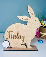 Load image into Gallery viewer, Personalised wooden Easter bunny decoration, engraved with custom name. Perfect for Easter gifts, baskets, and festive home decor