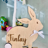 Load image into Gallery viewer, Personalised wooden Easter bunny decoration, engraved with custom name. Perfect for Easter gifts, baskets, and festive home decor