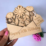 Load image into Gallery viewer, Wooden birthday card with floral design and 'Happy 80th Birthday' text, held by a hand.