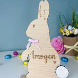 Load image into Gallery viewer, Personalised wooden Easter bunny decoration, engraved with custom name. Perfect for Easter gifts, baskets, and festive home decor