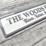 Load image into Gallery viewer, Personalized family nameplate on a wooden surface