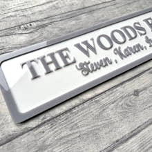 Load image into Gallery viewer, Personalized family nameplate on a wooden surface