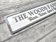 Load image into Gallery viewer, Personalized family nameplate on a wooden surface