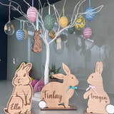 Load image into Gallery viewer, Personalised wooden Easter bunny decoration, engraved with custom name. Perfect for Easter gifts, baskets, and festive home decor