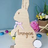 Load image into Gallery viewer, Personalised wooden Easter bunny decoration, engraved with custom name. Perfect for Easter gifts, baskets, and festive home decor
