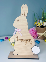 Load image into Gallery viewer, Personalised wooden Easter bunny decoration, engraved with custom name. Perfect for Easter gifts, baskets, and festive home decor