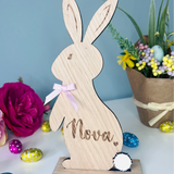 Load image into Gallery viewer, Personalised wooden Easter bunny decoration, engraved with custom name. Perfect for Easter gifts, baskets, and festive home decor