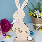 Load image into Gallery viewer, Personalised wooden Easter bunny decoration, engraved with custom name. Perfect for Easter gifts, baskets, and festive home decor