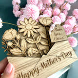 Load image into Gallery viewer, Personalised wooden Mothers day card with ‘Happy Mother’s day’ laser engraved on the front and a wooden gift tag with personalised gift details.