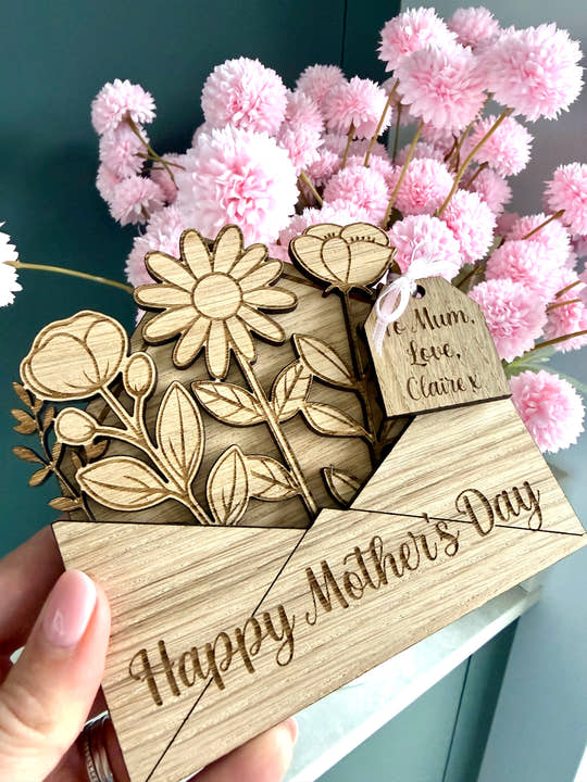 Personalised wooden Mothers day card with ‘Happy Mother’s day’ laser engraved on the front and a wooden gift tag with personalised gift details.