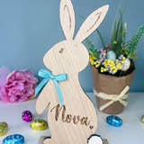 Load image into Gallery viewer, Personalised wooden Easter bunny decoration, engraved with custom name. Perfect for Easter gifts, baskets, and festive home decor