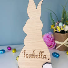 Load image into Gallery viewer, Personalised wooden Easter bunny decoration, engraved with custom name. Perfect for Easter gifts, baskets, and festive home decor