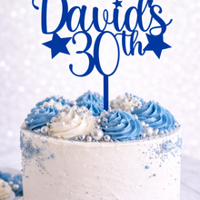 Load image into Gallery viewer, Personalised blue acrylic birthday cake topper with custom name and age on white celebration cake with blue buttercream and silver decorations.