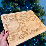 Load image into Gallery viewer, Wooden plaque with engraved text in front of a decorated Christmas tree