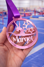 Load image into Gallery viewer, pale pink mirror acrylic personalised gymnastics medal held in hand with custom name design