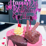 Load image into Gallery viewer, Pink mirrored acrylic personalised cake topper reading “Happy 12th Birthday Ella” displayed on a ice cream drip otake with flakes