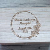 Load image into Gallery viewer, A wooden baby memory box with a brass effect latch, engraved with a floral design and text.