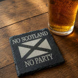 Load image into Gallery viewer, Slate coaster with Scottish flag design and 'No Scotland, No Party' text on a wooden surface with a glass of beer.