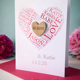 Load image into Gallery viewer, Personalised Valentine’s or anniversary card featuring heart shaped word art and engraved wooden heart centre, customised with names and special date