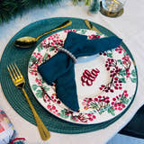 Load image into Gallery viewer, Christmas dinner table setting with personalised acrylic place name ‘Ella’ in red, festive plate and green napkin