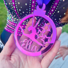 Load image into Gallery viewer, Pink gymnast medal being held by hand