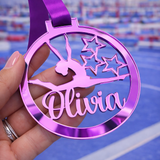 Load image into Gallery viewer, purple mirror acrylic personalised gymnastics medal held in hand with custom name design