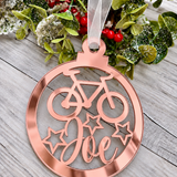 Load image into Gallery viewer, Personalised cyclist Christmas decoration in rose gold mirrored acrylic