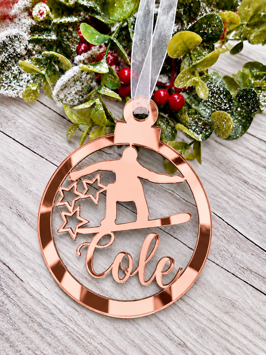 Personalised snowboarder Christmas decoration in rose gold mirrored acrylic