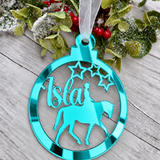 Load image into Gallery viewer, Personalised horse rider Christmas decoration in teal mirrored acrylic