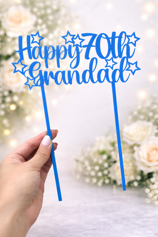 Blue acrylic Happy 70th Grandad birthday cake topper with star details