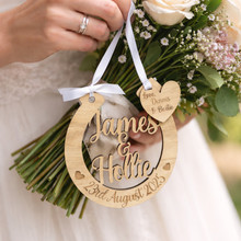 Load image into Gallery viewer, Handmade oak personalised wooden horseshoe engraved with names and date. Perfect rustic wedding décor, bridal bouquet charm, and meaningful wedding keepsake gift.