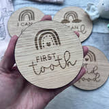 Load image into Gallery viewer, Personalised wooden baby milestone discs with rainbow theme, engraved with baby's milestones. Perfect for newborn gifts, baby showers, and capturing special moments.
