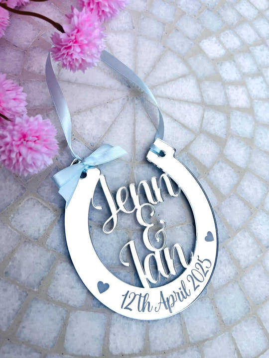 Silver wedding day horse shoe with personalised names and wedding date