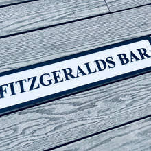 Load image into Gallery viewer, Personalised bar name sign mounted on outdoor wall, perfect for home bar, man cave, or garden pub decor