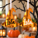 Load image into Gallery viewer, Two orange witch hat Halloween tree decorations showing the name in black and in white vinyl