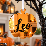 Load image into Gallery viewer, Personalised pumpkin Halloween tree decoration in orange mirrored acrylic with the name in black