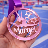 Load image into Gallery viewer, pale pink mirror acrylic personalised gymnastics medal held in hand with custom name design