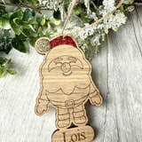 Load image into Gallery viewer, Personalised glittered Santa Christmas decoration in oak veneer (photo 6)
