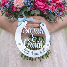 Load image into Gallery viewer, Personalised silver mirror wedding horseshoe hanging from bridal bouquet engraved Sarah & Grant 28th June 2025