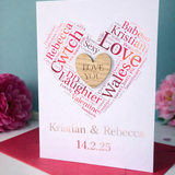 Load image into Gallery viewer, Personalised Valentine’s or anniversary card featuring heart shaped word art and engraved wooden heart centre, customised with names and special date