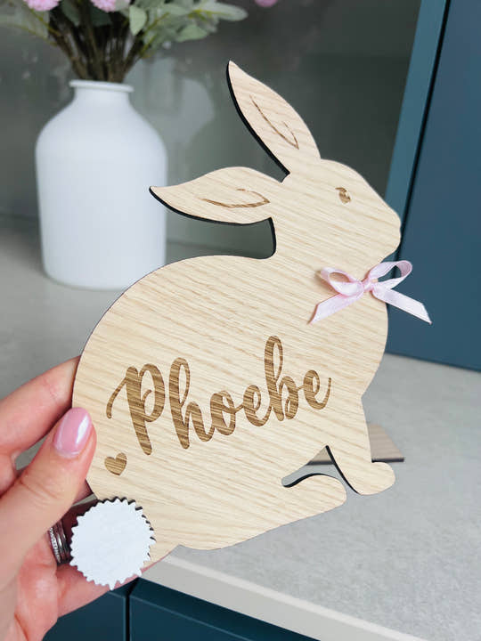Personalised wooden Easter bunny decoration, engraved with custom name. Perfect for Easter gifts, baskets, and festive home decor
