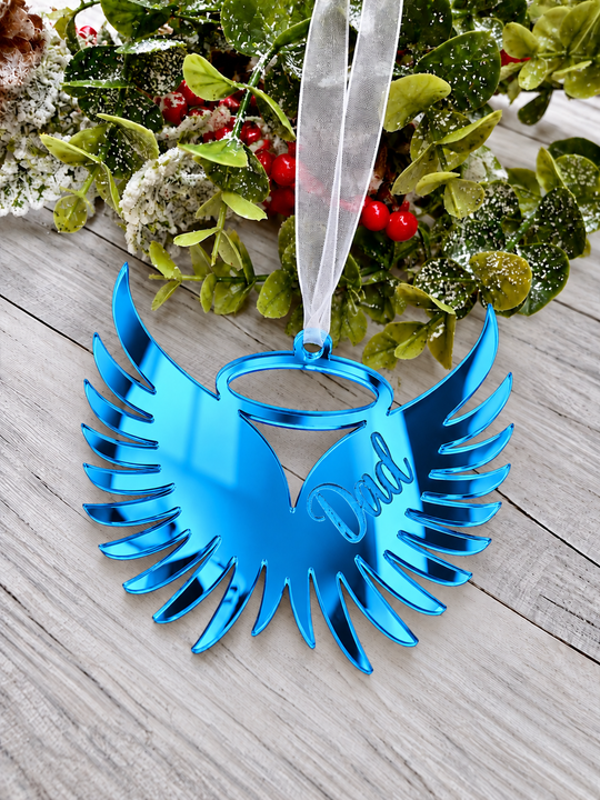 Angel wings in memory Christmas decoration in blue mirrored acrylic engraved with a name