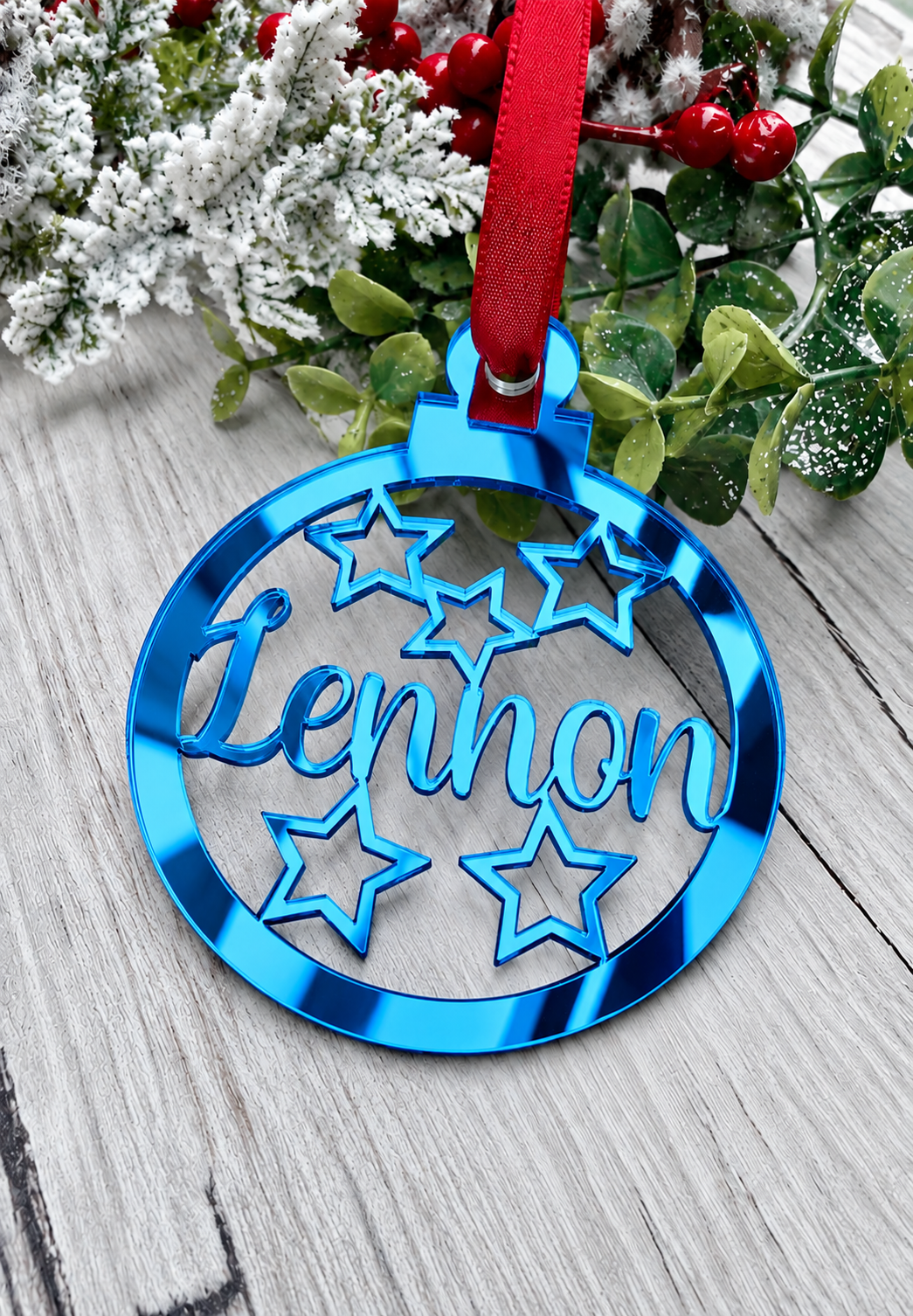 Load image into Gallery viewer, Personalised star Christmas decoration in blue mirrored acrylic
