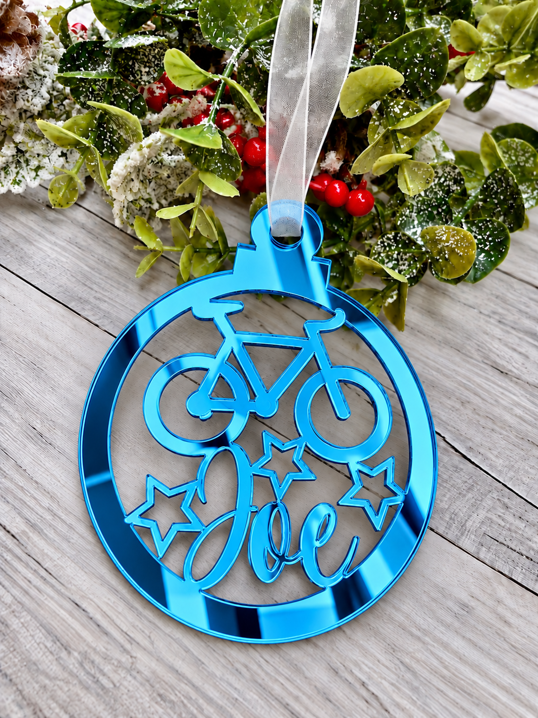 Load image into Gallery viewer, Personalised cyclist Christmas decoration in blue mirrored acrylic
