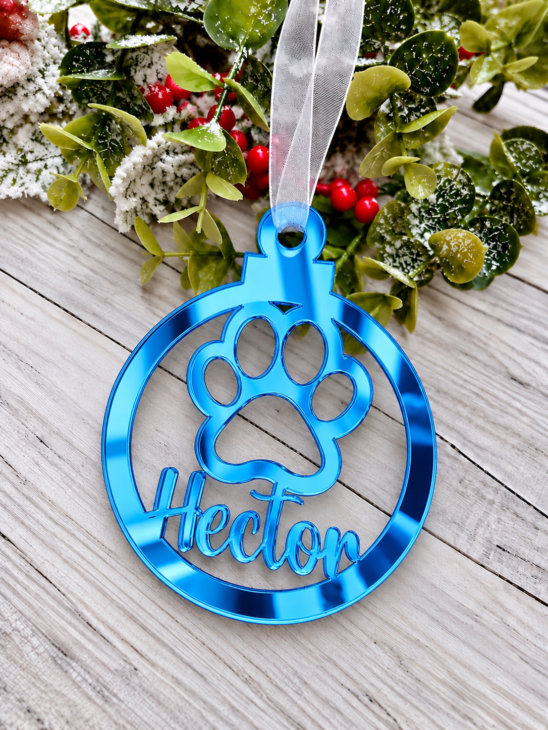 Load image into Gallery viewer, Personalised paw print Christmas decoration in blue mirrored acrylic
