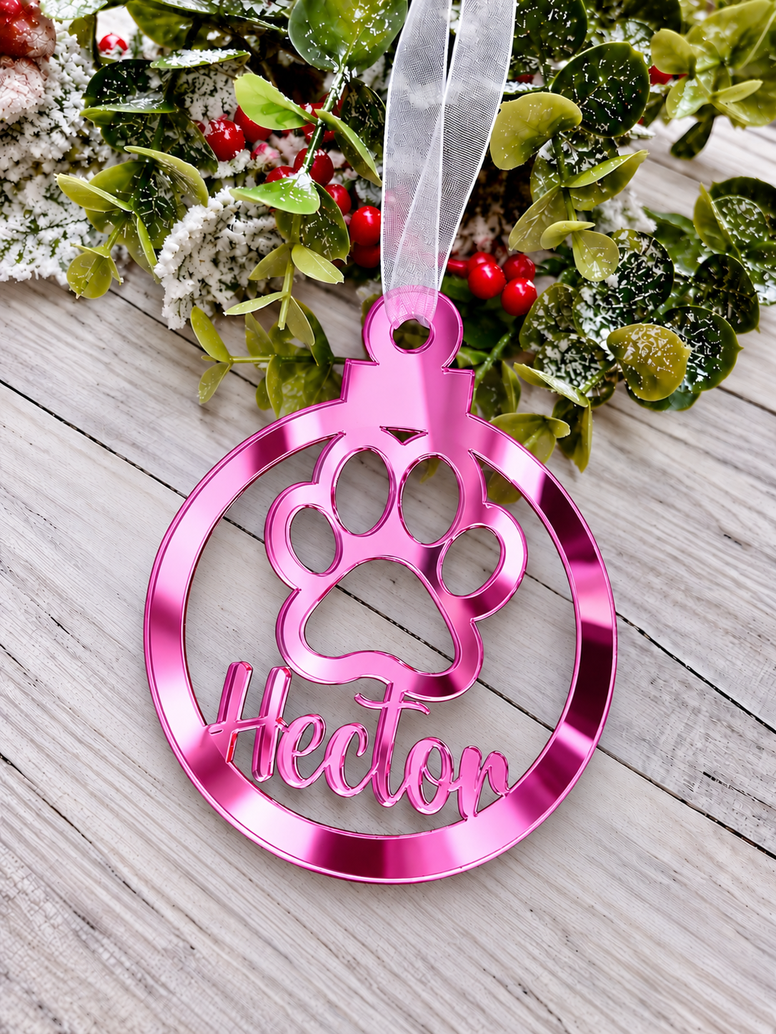 Load image into Gallery viewer, Personalised paw print Christmas decoration in pink mirrored acrylic
