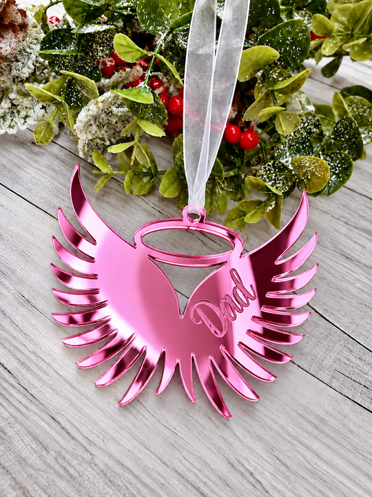 Angel wings in memory Christmas decoration in pink mirrored acrylic engraved with a name