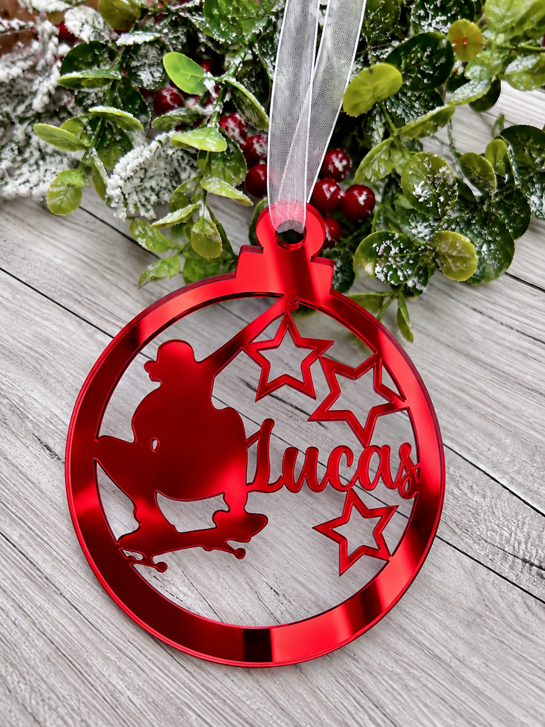 Load image into Gallery viewer, Personalised skateboarder Christmas decoration in red mirrored acrylic
