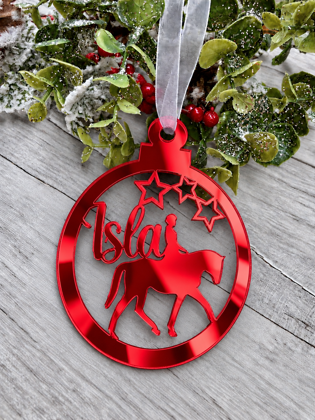 Load image into Gallery viewer, Personalised horse rider Christmas decoration in red mirrored acrylic
